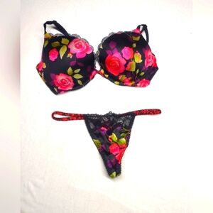 VS bra and panty set. Black with red, pink roses. Bra 36D, G-string is medium.